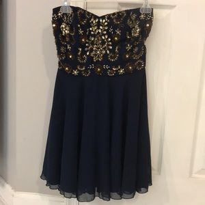 Navy embellished strapless mini dress